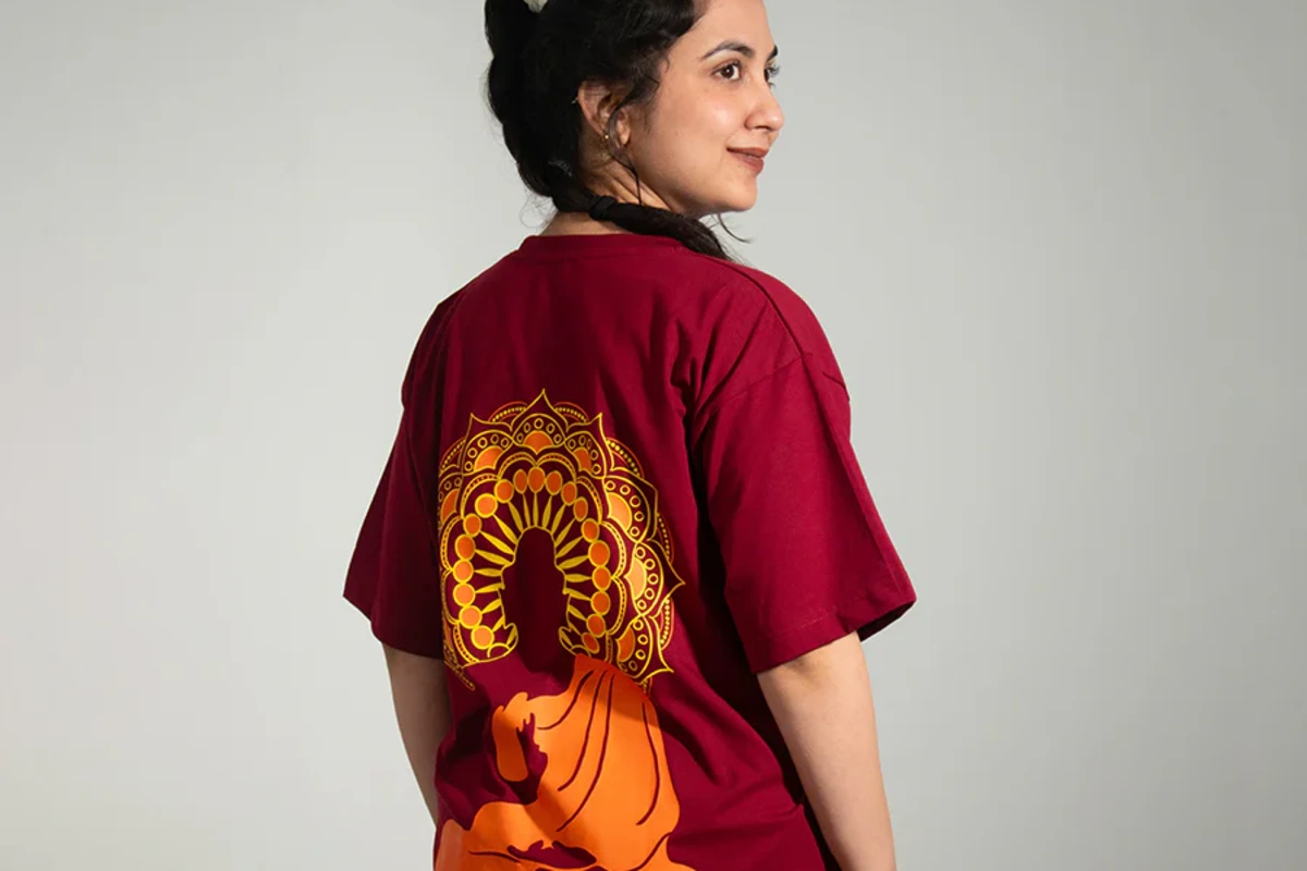 Devotional drop-shoulder t-shirt in organic cotton featuring intricate Buddhist sacred mandala art