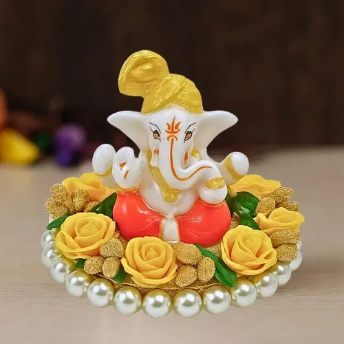 Lord Ganesha Idol on Decorative Flower Plate with Pearl Beads