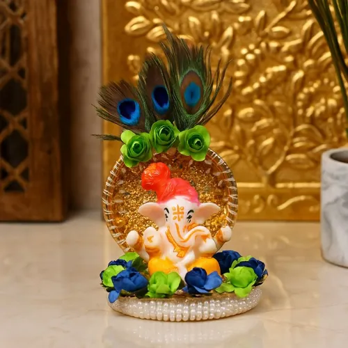 Lord Ganesha Idol with Real Peacock Feathers and Golden Disc Plate