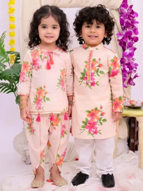 Girls Peach Floral Print Cotton Kurti Dhoti Set and Boys Off White Floral Printed Cotton Kurta Pyjama Set