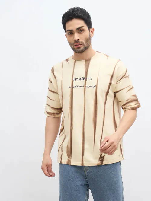 Beige Spray Print T-Shirt – "प्रबलः कर्मसिद्धान्तः" (The Law of Karma is Powerful)