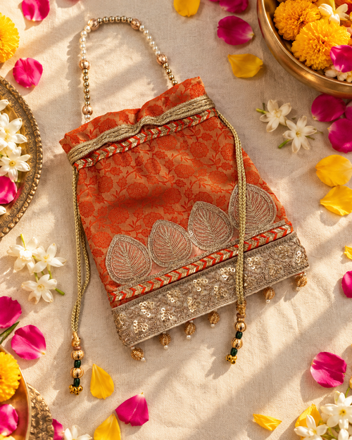 Golden Sunset Orange Brocade Potli with Pearl Handle and Bead Drops